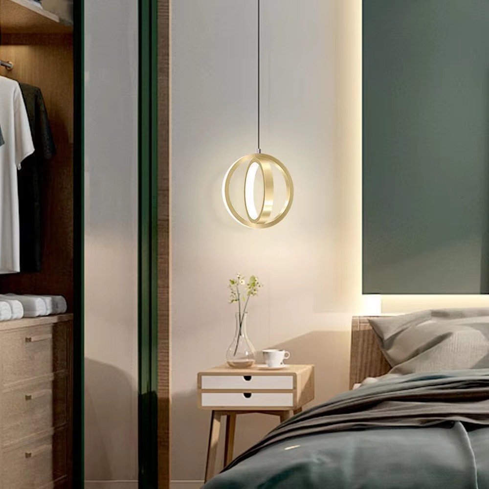 Light luxury double-ring staggered wall lamp (gold metal ring + built-in light strip), warm light effect, creating a stylish and high-end bedroom atmosphere.