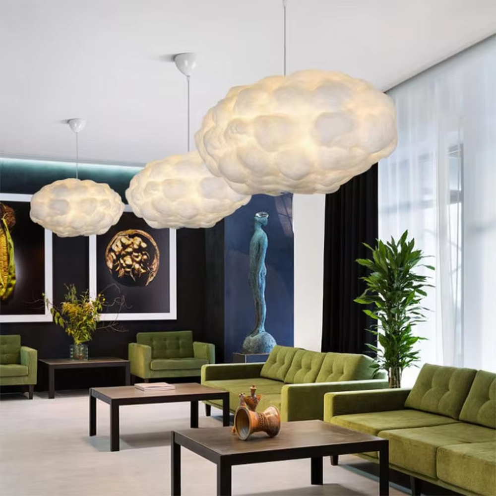 This dreamy cloud-shaped chandelier is made of fluffy fiber/fabric material, simulating the shape of real clouds, transmitting light softly and hung in varying sizes. It serves both lighting and decorative purposes, ideal for Internet celebrity restaurants, cafes, children's rooms, cultural and creative spaces and other scenarios.