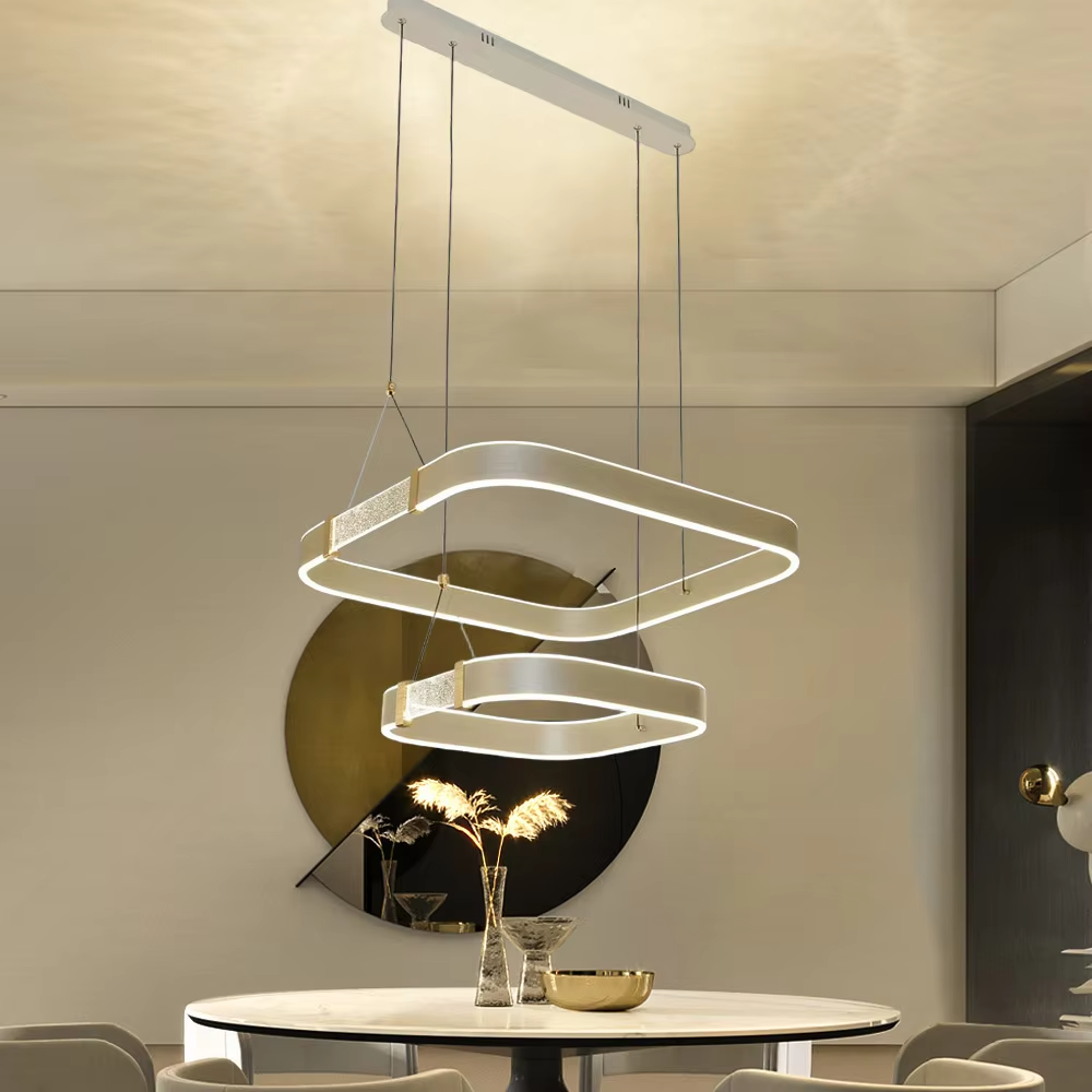 This is a modern minimalist white double-ring chandelier, with double-layer white ring lamp bodies and partial embedded crystal elements, featuring a minimalist and grand design, soft lighting. It is used for space lighting and decoration, creating a modern and warm atmosphere. Suitable for modern minimalist restaurants, living rooms, creative office areas and other places.
