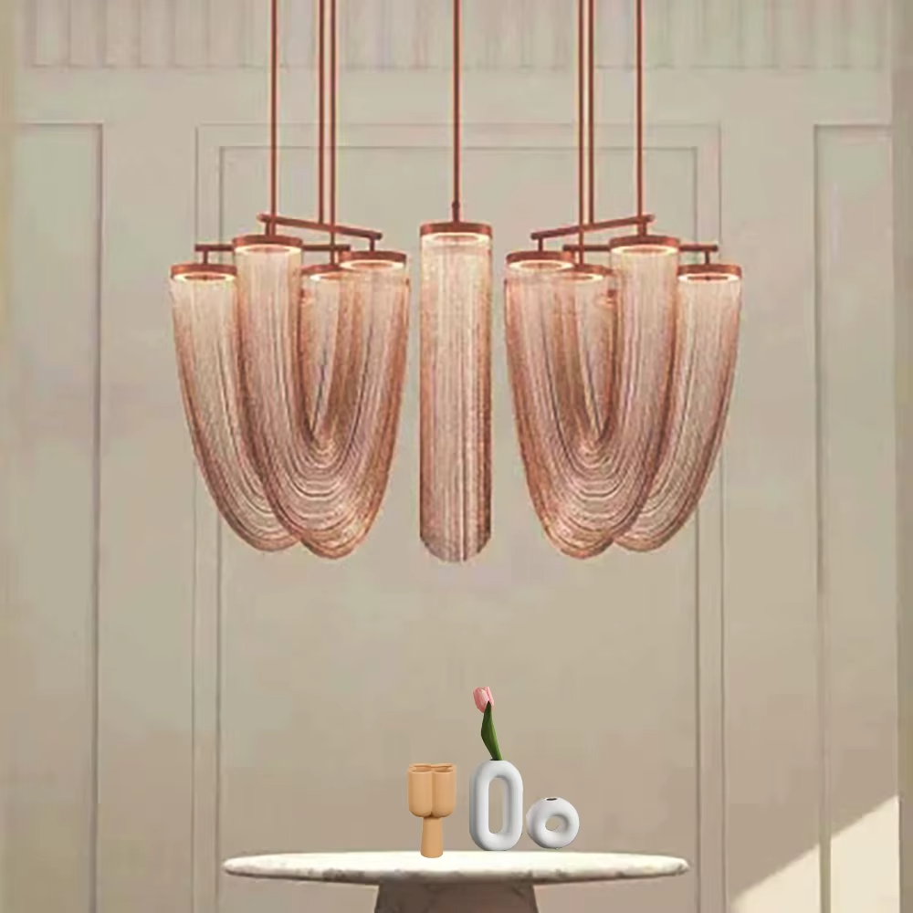 Luxury U-shaped metal chain chandelier (gold chain + warm light), warm light effect, creating a high-end dynamic light luxury space atmosphere.