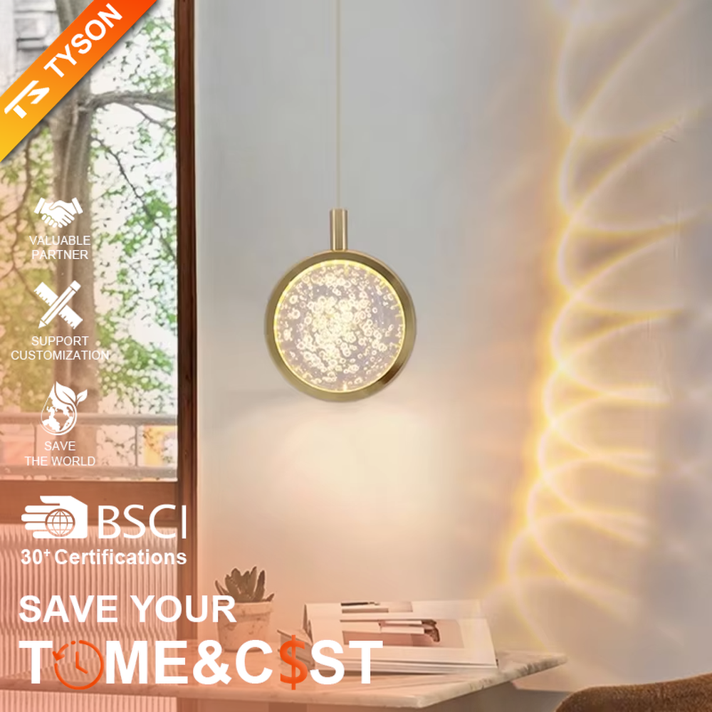 This light luxury small round chandelier features a gold metal frame, a transparent panel with delicate patterns such as jellyfish/birds, and projects ripple light and shadow on the wall when lit, serving both lighting and decorative purposes, ideal for bedroom bedside tables, light luxury homestays, high-end hotel rooms and other spaces.