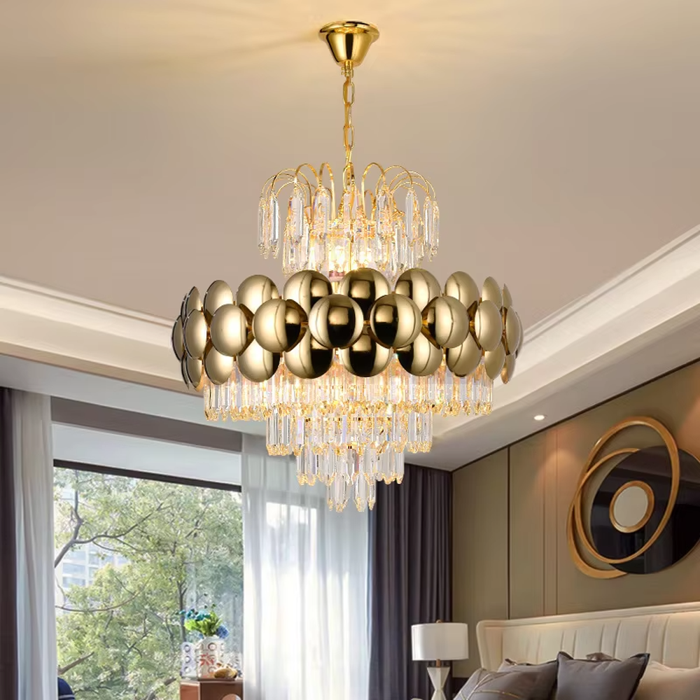 This is a luxurious modern-style golden spherical crystal multi-layer chandelier, combining golden metal spherical elements with multi-layer crystals. It features a grand and luxurious design with brilliant lighting. It is used for space lighting and decoration, creating a high-end luxurious atmosphere. Suitable for light luxury-style restaurants, luxury living rooms, high-end hotel banquet halls and other places.