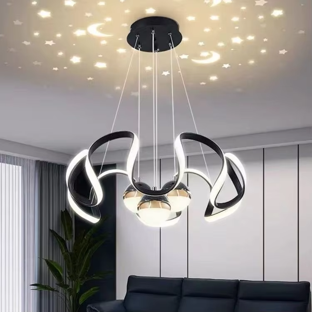 This is a childlike artistic golden starry sky projection chandelier, with golden curved light strips and starry sky decorated spherical lamps, which can project star and moon patterns onto the ceiling. The design is childlike and dreamy, with warm lighting. It is used for space lighting and atmosphere creation, suitable for children's rooms, modern-style bedrooms, childlike theme living rooms and other places.