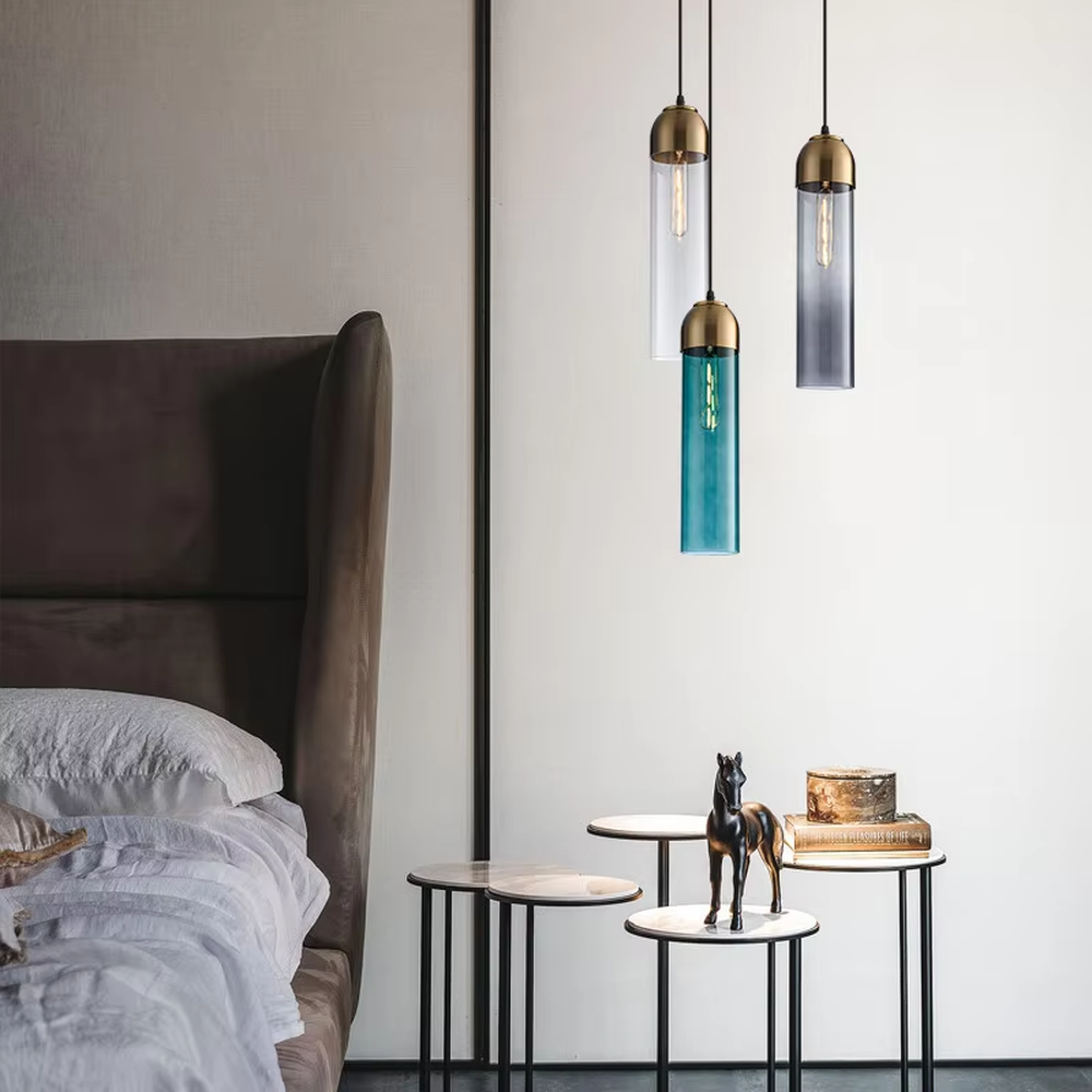 Modern minimalist multi-color glass cylinder chandelier (gold/black top trim), warm light effect, creating a fresh and versatile minimalist space atmosphere.