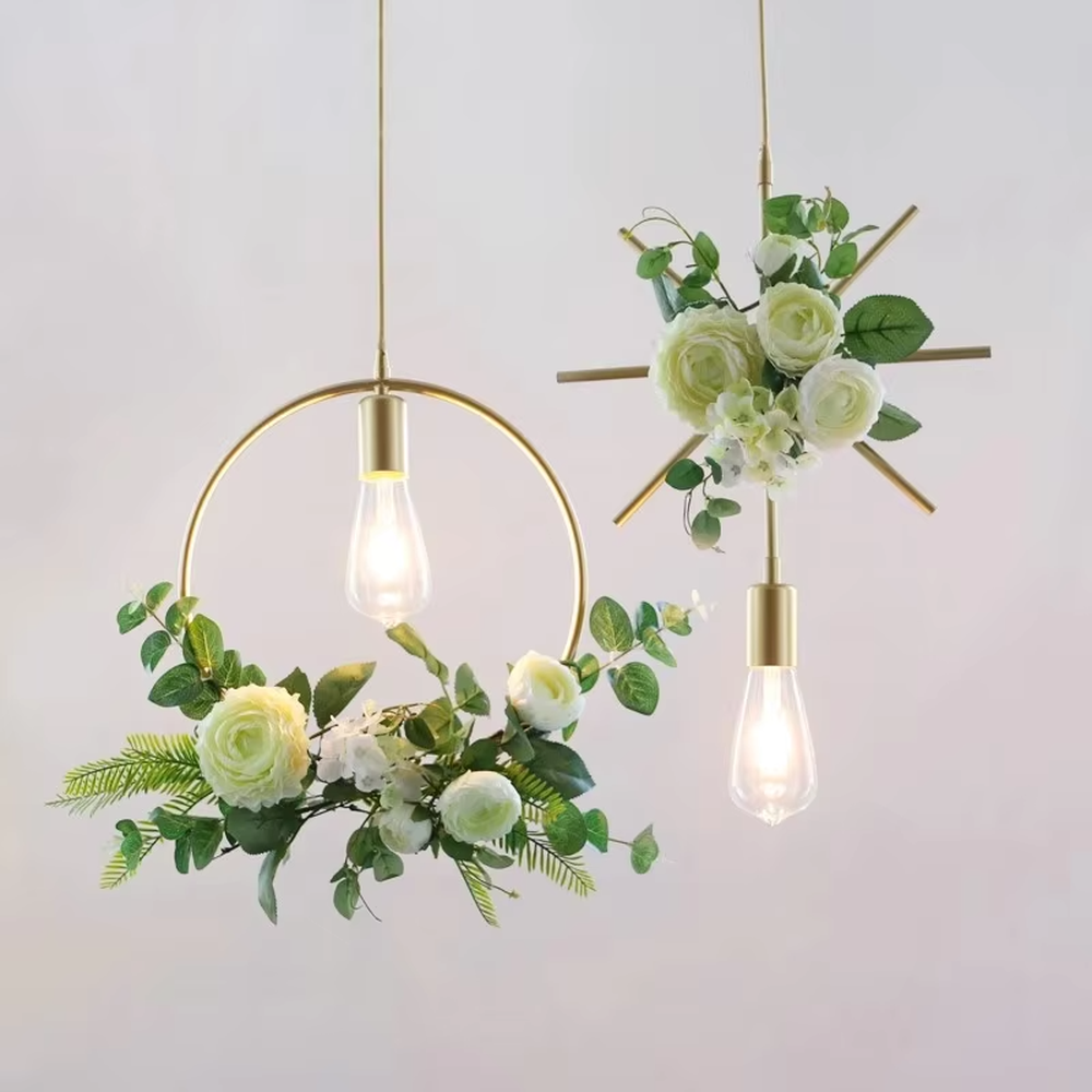 This is a natural and fresh floral metal chandelier, including two styles of golden circular and radial metal frames, paired with artificial green plants, flowers and transparent bulbs. It features a natural and romantic design with warm and soft lighting. It is used for space lighting and decoration, creating a natural and romantic atmosphere. Suitable for Nordic-style homes, literary cafes, wedding venues, art homestays and other places.
