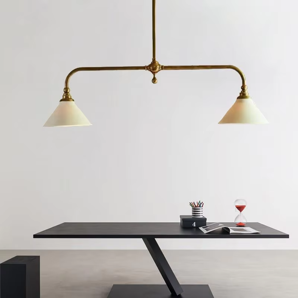 This is a Nordic retro-style double-head chandelier, with a golden metal stand and white conical lampshades, featuring a minimalist retro design and warm texture. It is used for space lighting and decoration, creating a warm retro atmosphere. It is suitable for Nordic-style restaurants, retro-style home living rooms, homestay dining areas and other places.