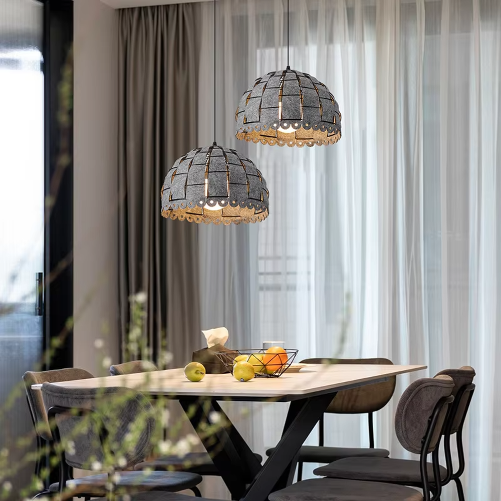 This is a modern minimalist gray spliced dome chandelier, with a gray spliced dome shape and lace-like details on the edge, featuring a minimalist and textured design. It is used for space lighting and decoration, creating a warm and modern atmosphere. Suitable for modern minimalist restaurants, Nordic-style home living rooms, creative cafes and other places.