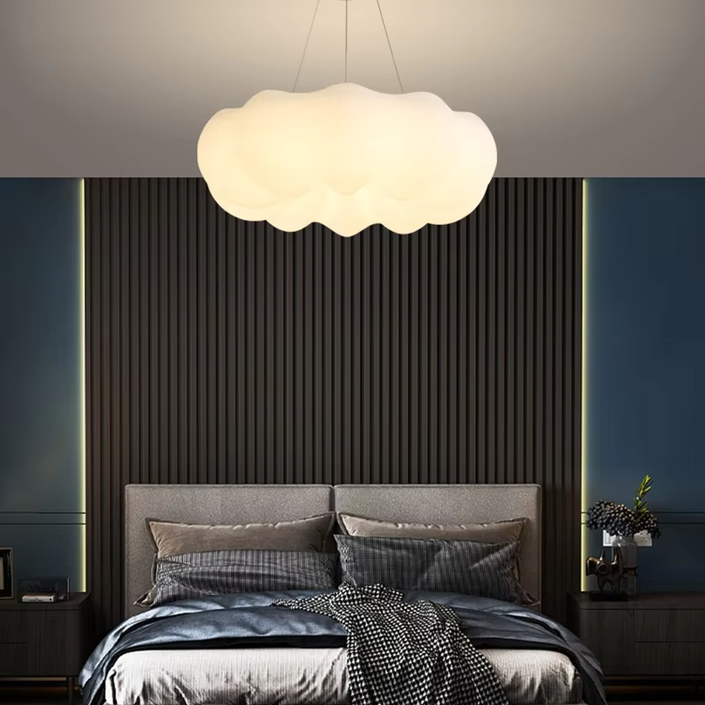 Modern minimalist cloud-shaped soft light chandelier, milk-white translucent material + warm light effect, creating a warm and healing home atmosphere.