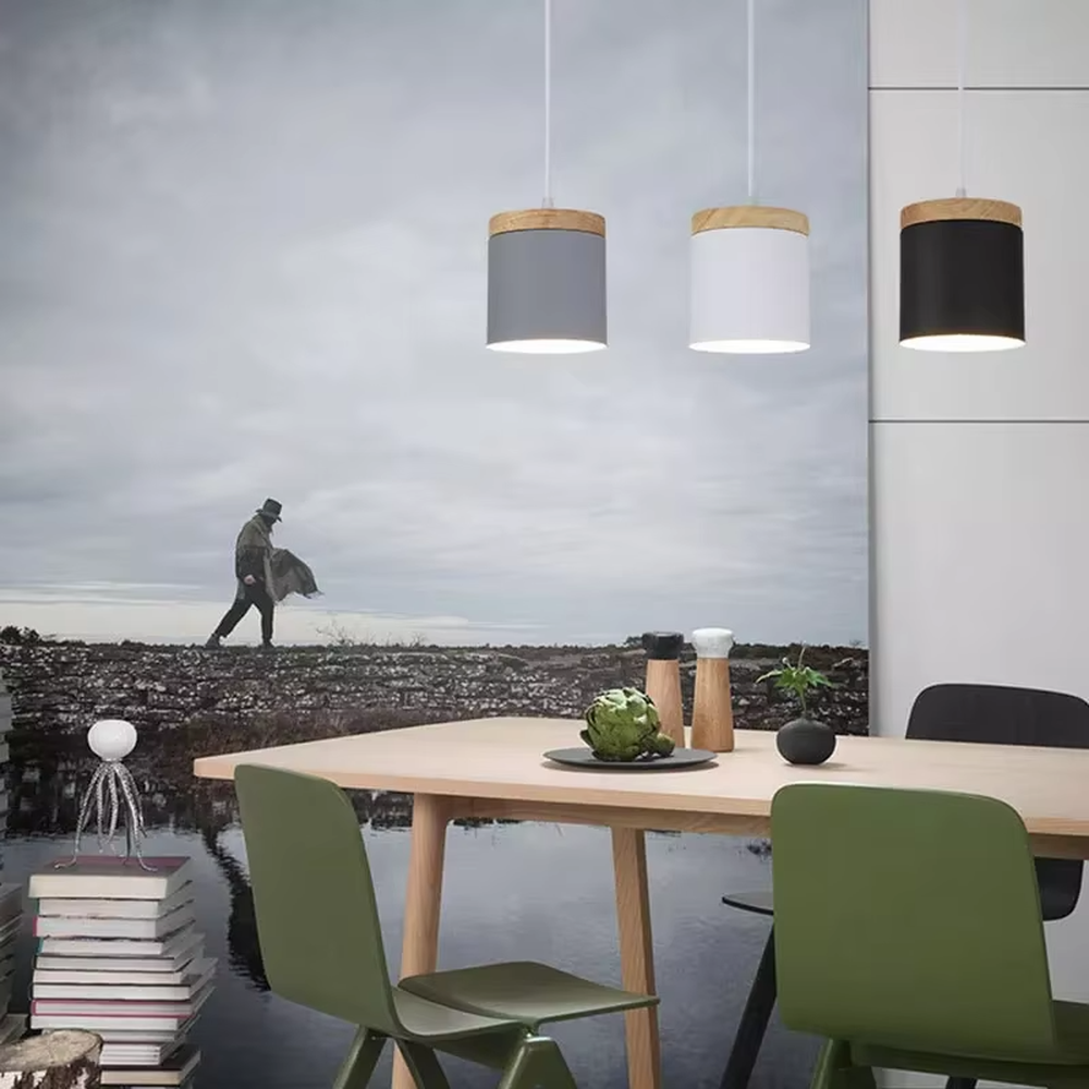 Minimalist black-wood cylindrical double-unit hanging lamp, black cylindrical lampshade + wooden top decoration + thin suspension rope, soft and uniform light, creating a simple natural home atmosphere.