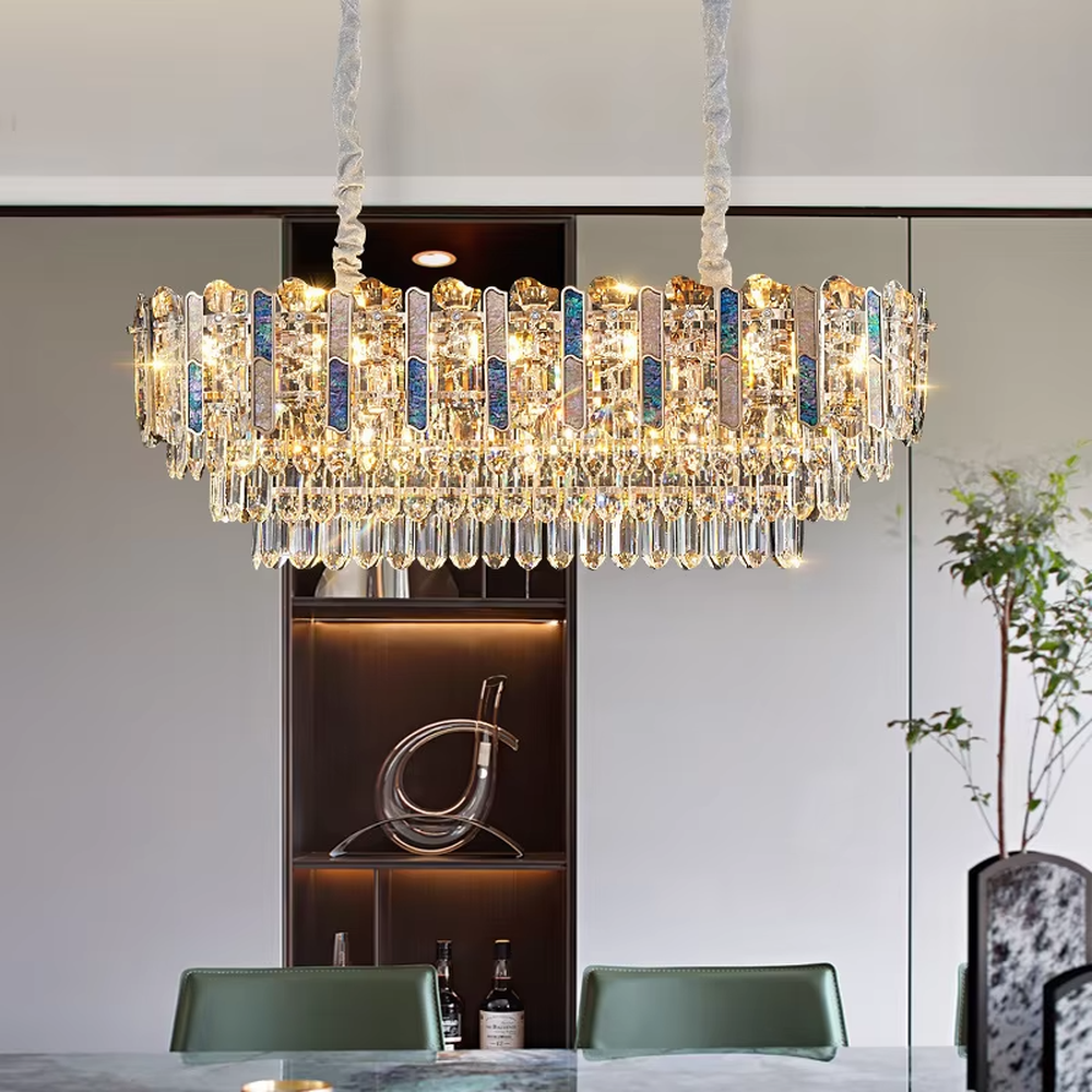 Light luxury circular golden crystal chandelier, dotted with blue decorative blocks, brilliant and gorgeous lighting, creating a high-end light luxury atmosphere.
