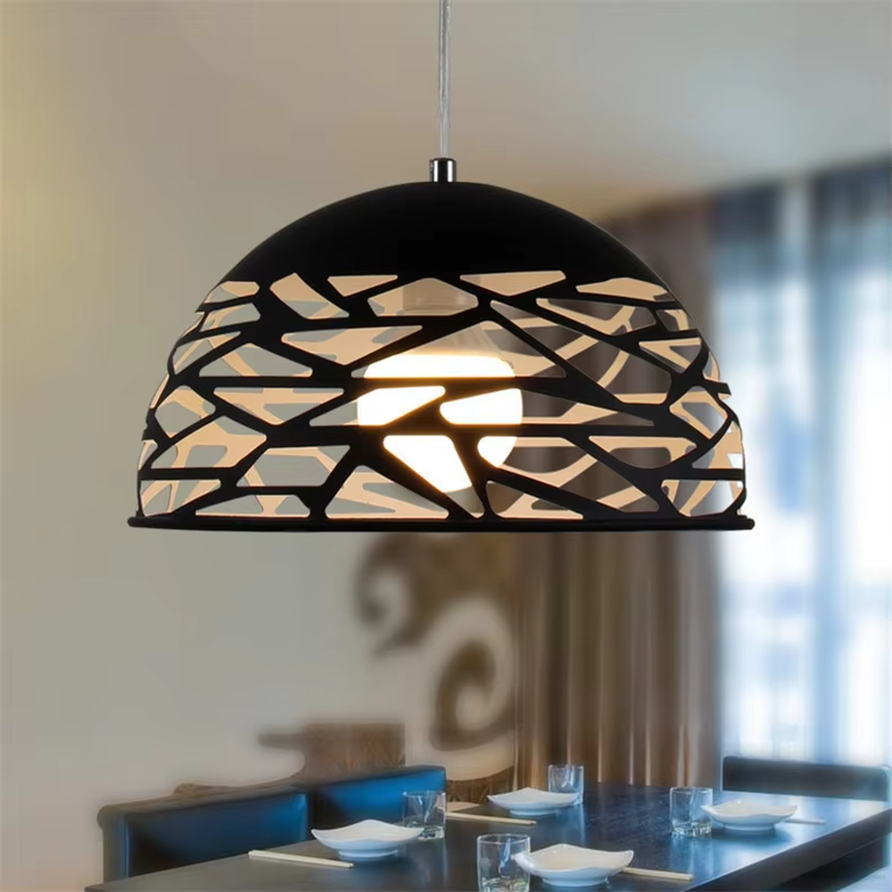 This minimalist hollow spherical chandelier features irregular hollow textures made of metal, available in black and white color options. It emits soft diffused light when lit, serving both lighting and decorative purposes, ideal for dining rooms, living rooms, modern homes and other scenarios.
