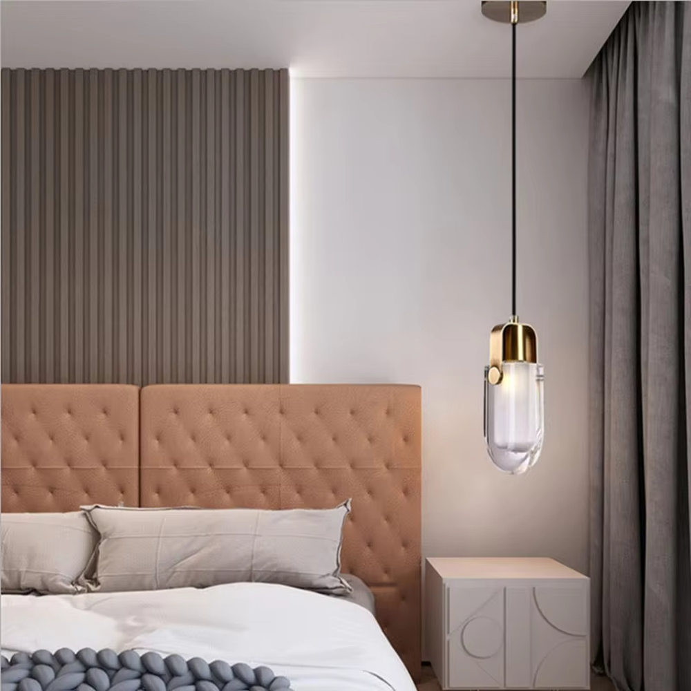 Light luxury gold-decor water-drop glass hanging lamp, golden metal trim + transparent water-drop glass main body, warm light with soft halo, creating a high-end artistic light luxury atmosphere.