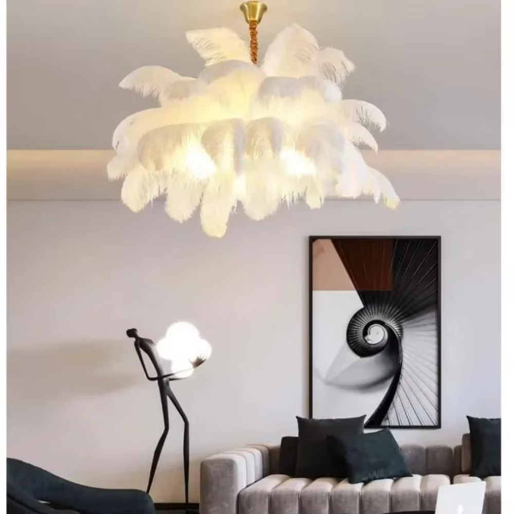 This is an artistic feather-shaped chandelier with layered dark blue feathers, featuring luxurious artistic sense. It is used for space lighting and decoration, creating a romantic and luxurious atmosphere. It is suitable for luxury-style home living rooms, art clubs, high-end homestays and other places.