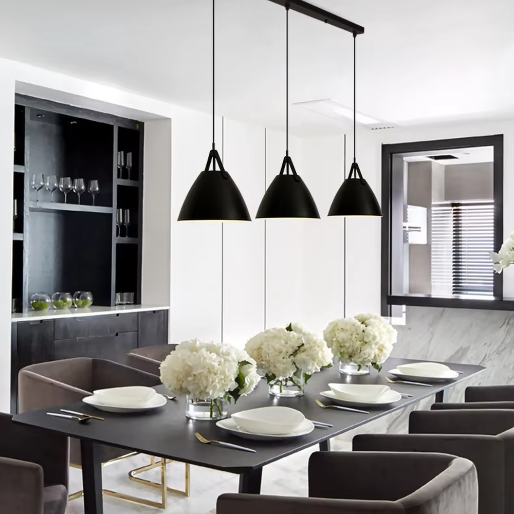 This set of Nordic-style glass lighting includes a table lamp and a chandelier, with drum-shaped lampshades made of blue-gray gradient glass. The table lamp is paired with a black tripod base, and the chandelier uses a suspension design, emitting soft and transparent light, serving both lighting and decorative purposes, ideal for bedrooms, dining rooms, Nordic-style homes and internet-famous shops and other scenarios.