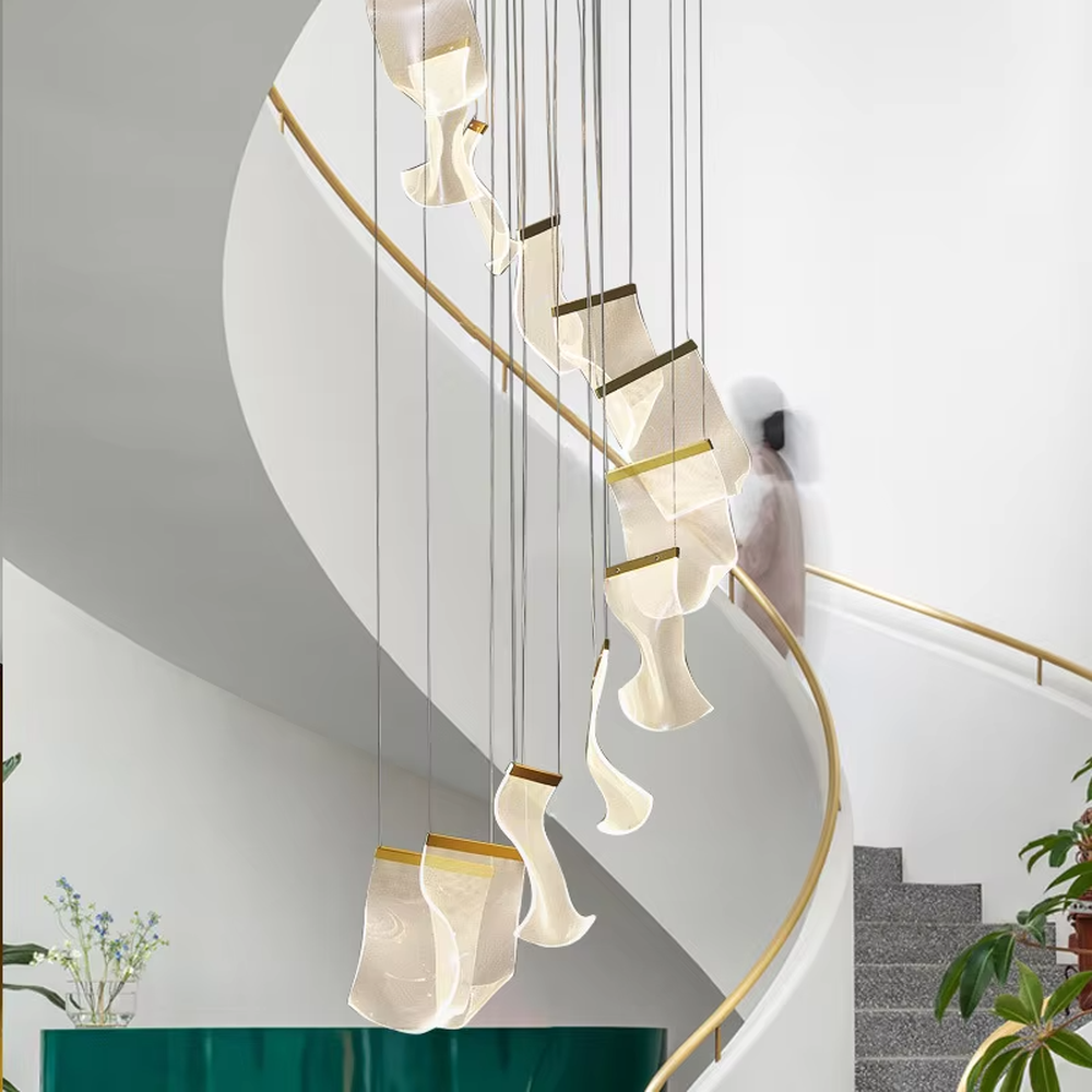 Modern artistic spiral-hung leaf-shaped chandelier, translucent lampshades + golden decorations, soft lighting, creating a high-end artistic atmosphere.
