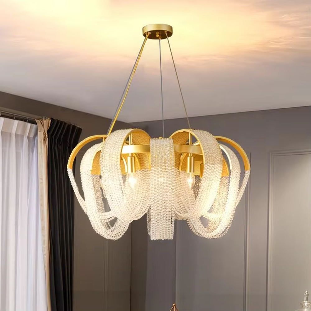 Light luxury golden frame pearl string bud-shaped chandelier, warm light effect, creating an exquisite and soft space atmosphere.