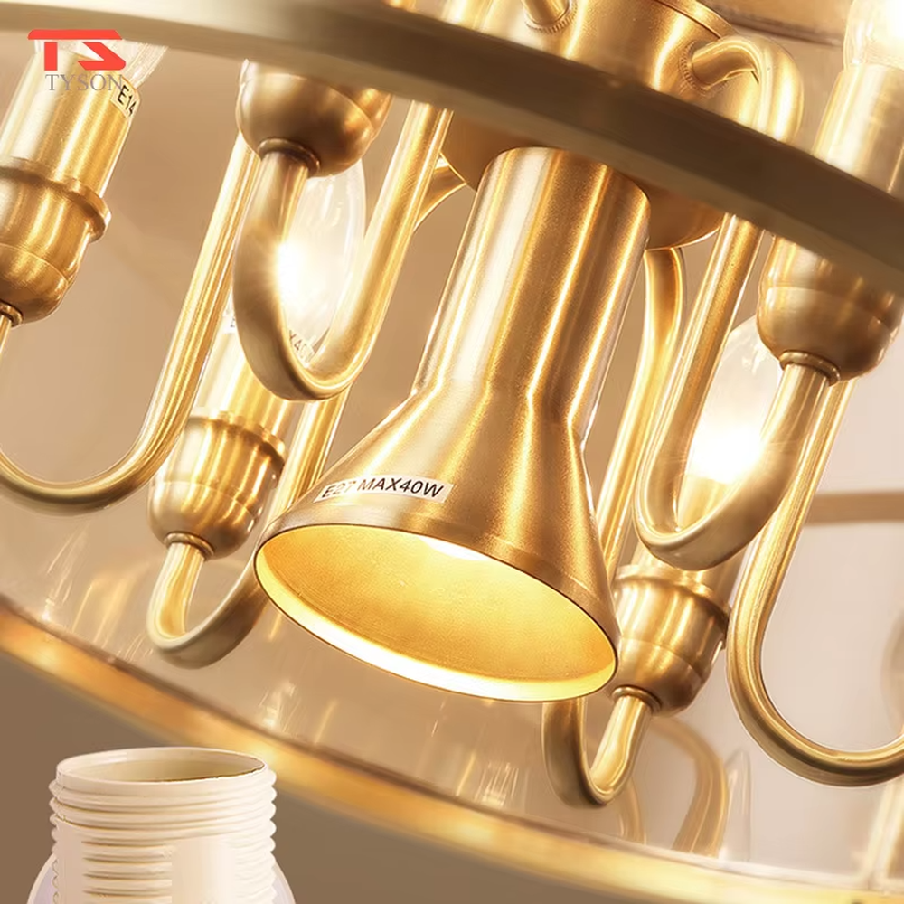 Light luxury golden metal frame glass cover candelabra chandelier, golden metal frame + transparent glass outer cover + candle-shaped bulbs, soft warm light, creating a vintage light luxury bedroom atmosphere.