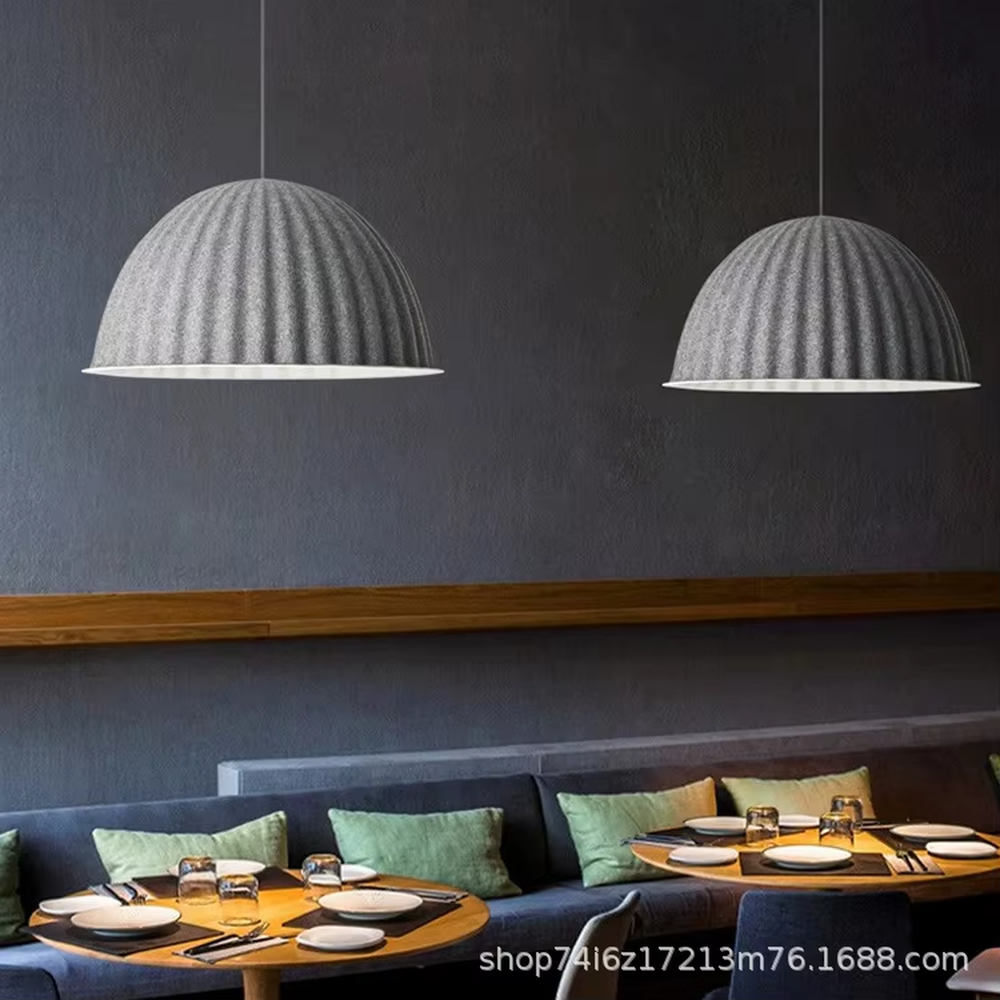This is a modern minimalist gray striped dome chandelier, with a gray striped dome shape, featuring a minimalist and grand design, modern style. It is used for space lighting and decoration, creating a minimalist modern atmosphere. It is suitable for modern minimalist restaurants, Nordic-style home living rooms, office leisure areas and other places.