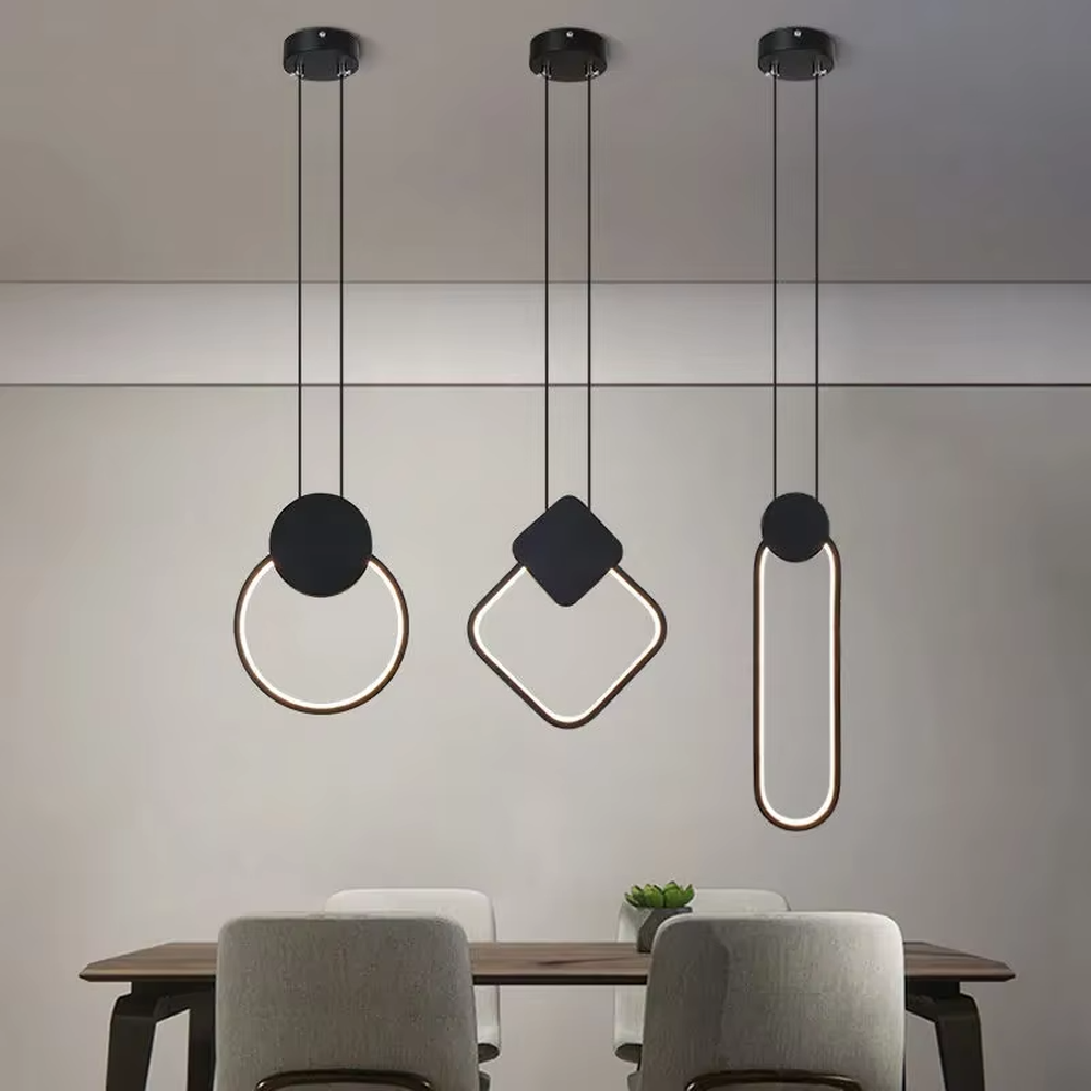 Modern minimalist geometric shape combination hanging lamp, three shapes (circle/diamond/long ellipse) + black-brown line lamp body + thin suspension rope, soft and uniform light, creating a simple high-end home atmosphere.