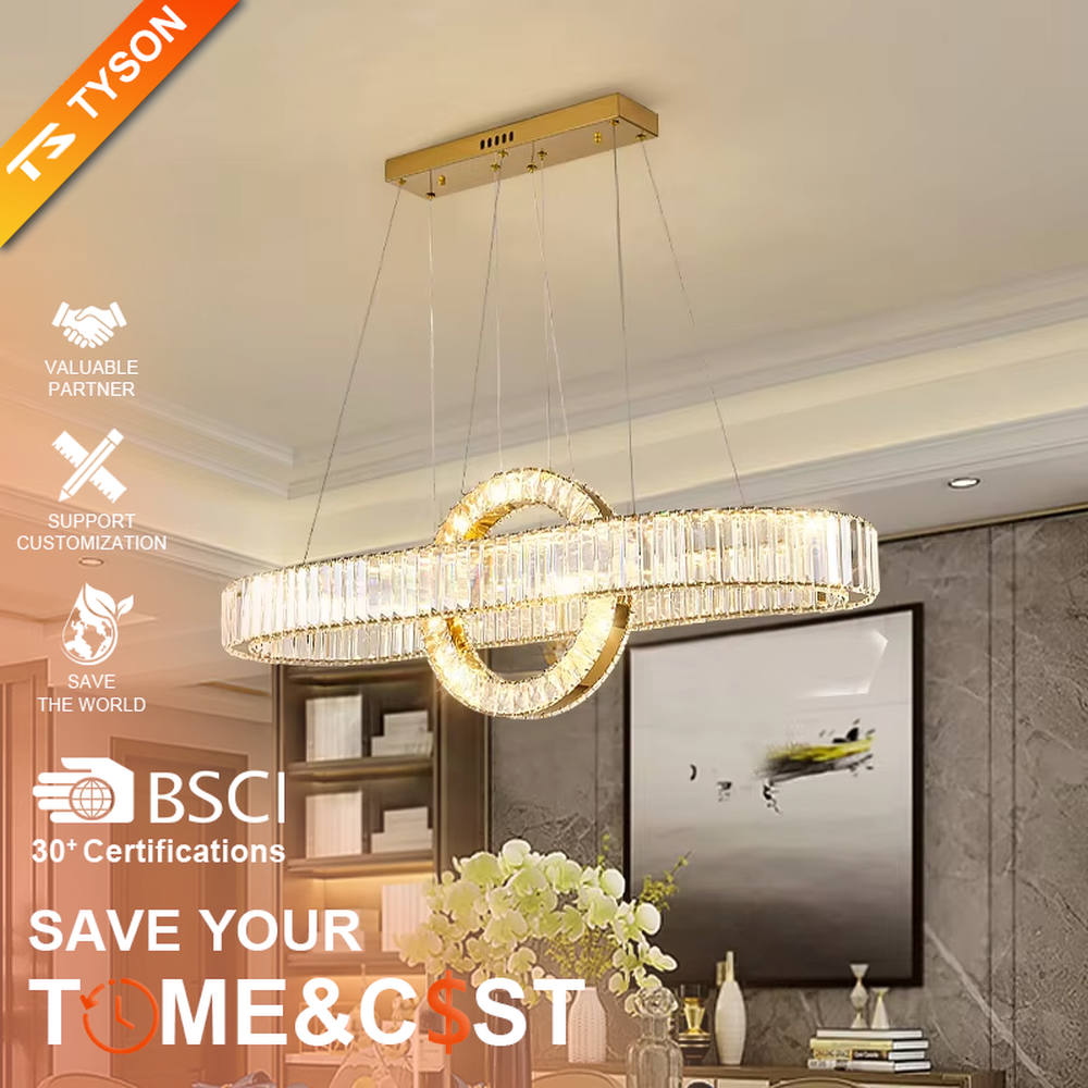 This is a light luxury and luxurious long strip ring crystal chandelier, with a golden metal frame paired with transparent crystals, adopting a combination of long strip and ring shape. When lit, the light is brilliant and gorgeous, creating a high-end light luxury atmosphere.