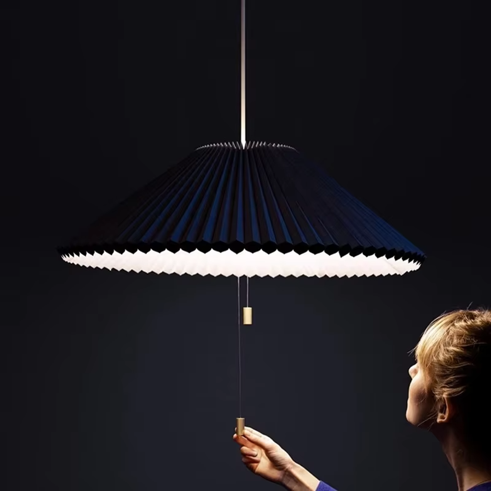 This modern minimalist fan-shaped chandelier features a light lake blue pleated fabric lampshade with a black edge, in an umbrella-shaped suspended style, serving both lighting and decorative purposes, ideal for modern minimalist spaces such as dining rooms, living rooms, and wabi-sabi cafes.