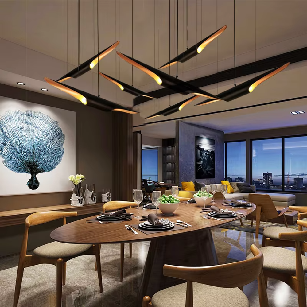 This modern minimalist wing-shaped chandelier features a black metal body with warm light LED strips embedded in the edges, hung in a scattered bird-like shape. It serves both lighting and decorative purposes, ideal for high-ceiling living rooms, light luxury restaurants, high-end office spaces and other scenarios.