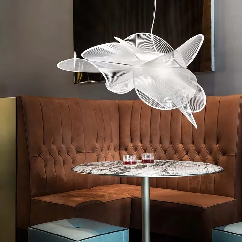Modern art petal chandelier, multi-layer three-dimensional petal shape made of white semi-transparent PET material, with light and transparent lines, designed to enhance the artistic atmosphere of spaces, suitable for living rooms, clubs, art exhibition halls and other modern high-end spaces