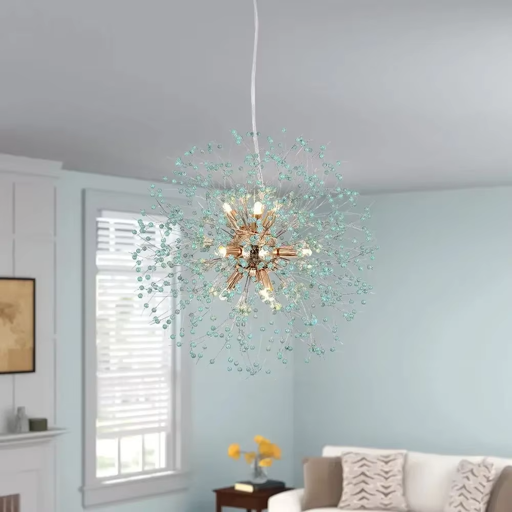 This is an artistic dandelion-shaped chandelier with blue-green crystal beads in a spherical divergent design and a golden central bracket, featuring a fresh and artistic sense. It is used for space lighting and decoration, creating a fresh and luxurious atmosphere. It is suitable for Nordic-style home living rooms, art foyers, luxury restaurants and other places.