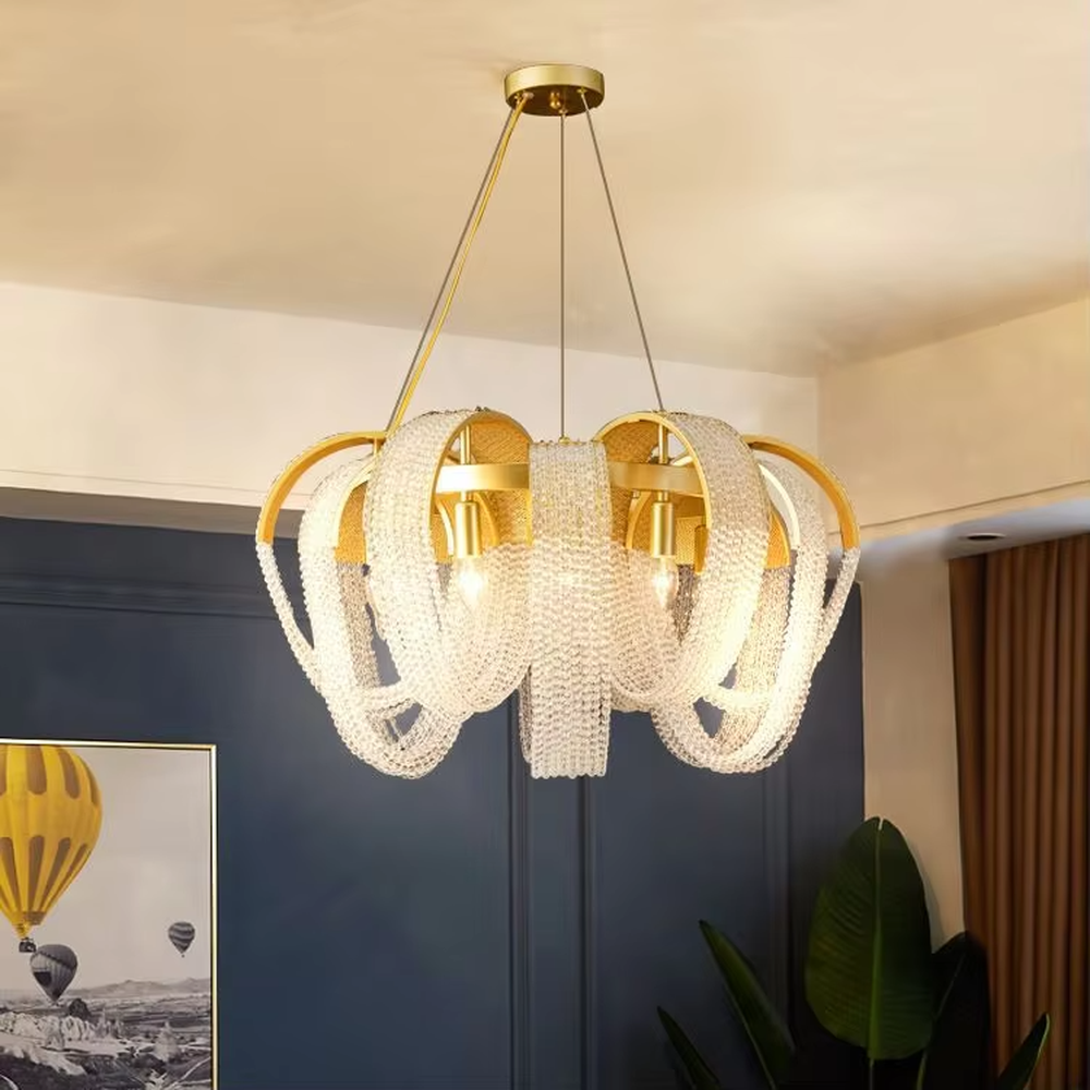 Light luxury golden curved frame full-set cut crystal chandelier, candle-shaped bulbs + brilliant warm light, creating luxurious dining atmosphere.