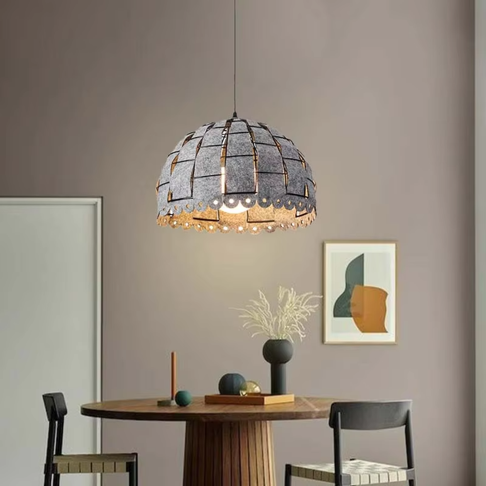 This is a modern minimalist gray spliced dome chandelier, with a gray spliced dome shape and lace-like details on the edge, featuring a minimalist and textured design. It is used for space lighting and decoration, creating a warm and modern atmosphere. Suitable for modern minimalist restaurants, Nordic-style home living rooms, creative cafes and other places.