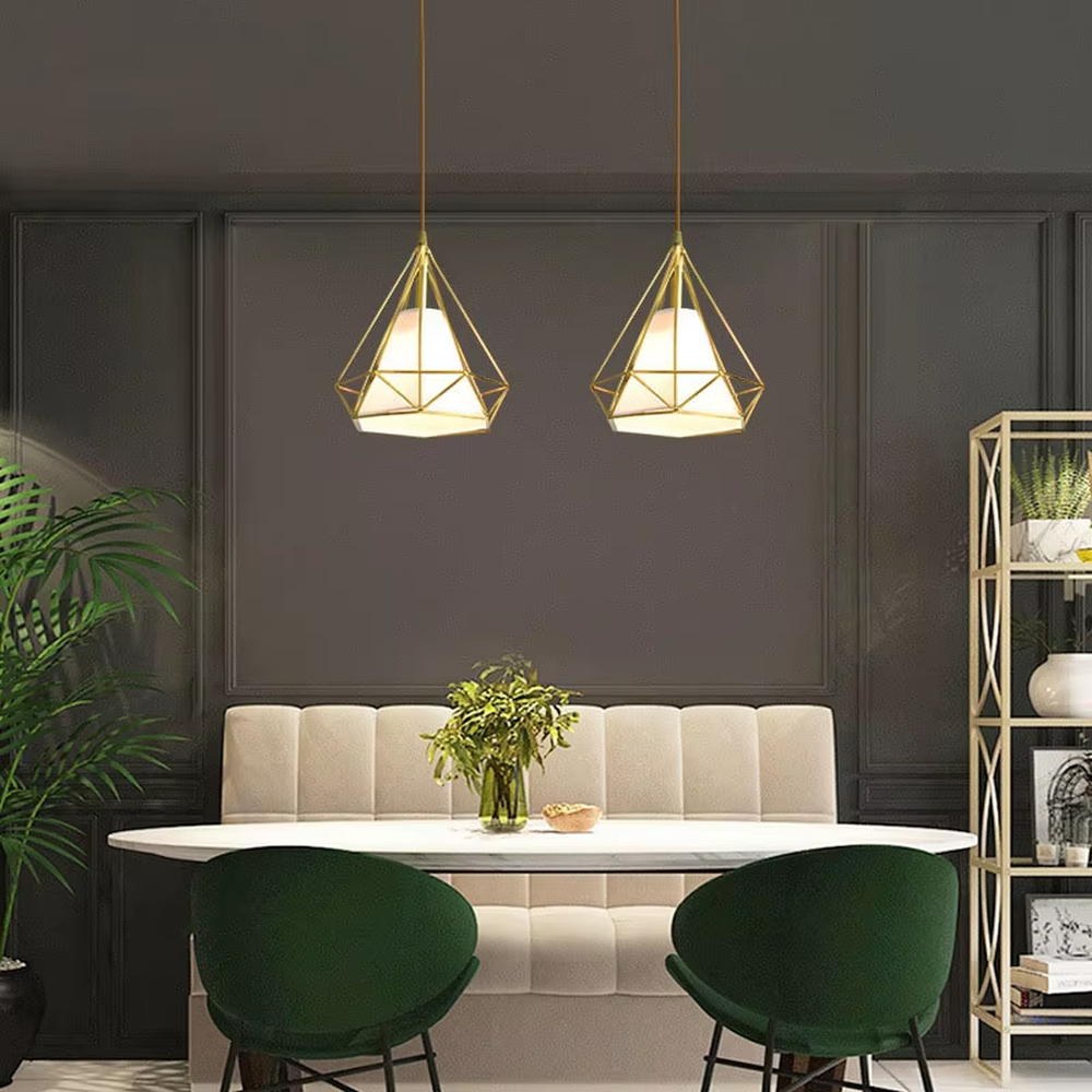 Light luxury geometric diamond triple chandelier (gold metal frame + translucent lampshade), warm light effect, creating a stylish and exquisite space atmosphere.