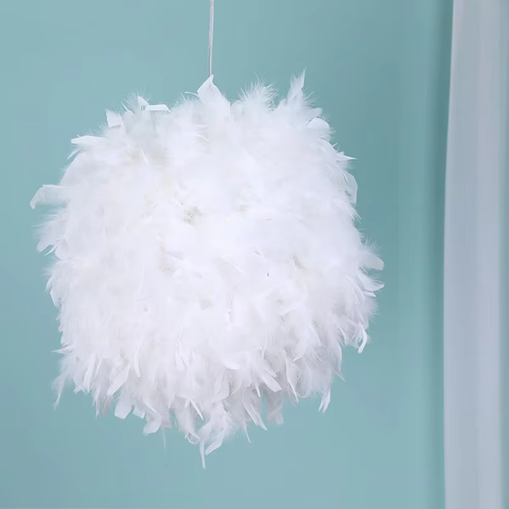 Dreamy feather spherical chandelier (pure white feather lampshade + thin hanging wire), warm light effect, creating a soft and healing space atmosphere.