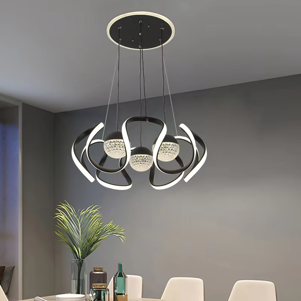 This light luxury gold ring chandelier consists of interlaced metal light strips and textured crystal lamp shades, shaped like blooming flowers with soft, artistic lines. It serves both lighting and decorative purposes, ideal for modern light luxury home and commercial spaces such as dining rooms and living rooms.