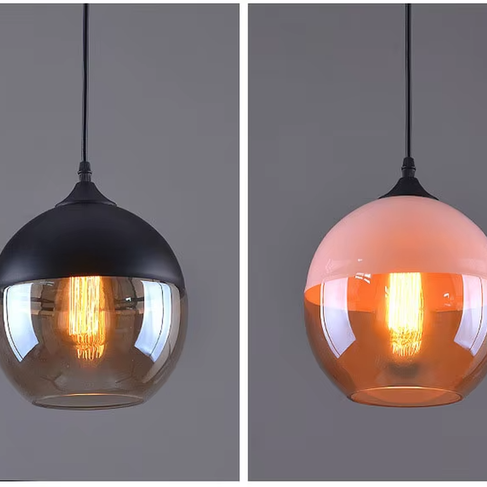 This set of Nordic-style creative small chandeliers features black metal top covers paired with amber glass lampshades, with various shapes that can be hung in combination, serving both lighting and decorative purposes, ideal for dining rooms, bars, Nordic-style homes and other scenarios.