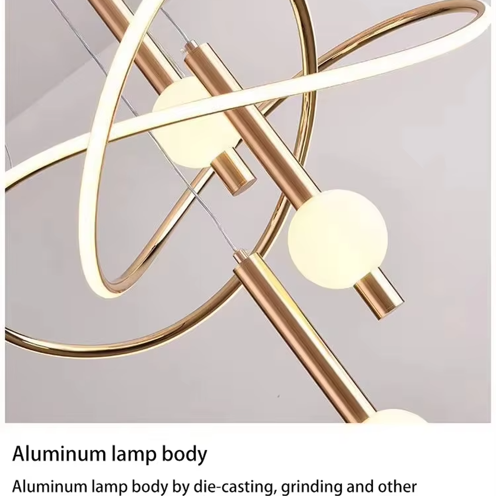 This is a modern creative cross-ring spherical chandelier, featuring white cross-ring light strips paired with spherical lamp bodies. The design is simple and artistic, with soft and uniform lighting. It is used for space lighting and decoration to create a modern artistic atmosphere. Suitable for modern-style living rooms, minimalist dining areas, modern apartments and other places.