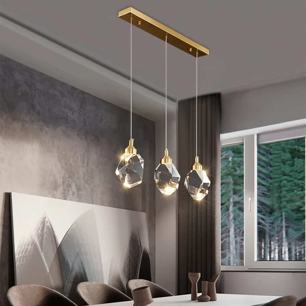 Light luxury modern 3-head cut crystal long-rod chandelier, golden long-rod ceiling mount + cut crystal balls (golden top) + warm light effect, creating an exquisite luxurious atmosphere in small spaces.