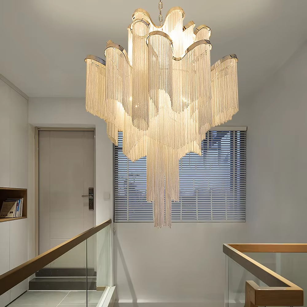 Light luxury waterfall crystal chain chandelier (warm light), warm light effect, creating a luxurious and soft high-end space atmosphere.