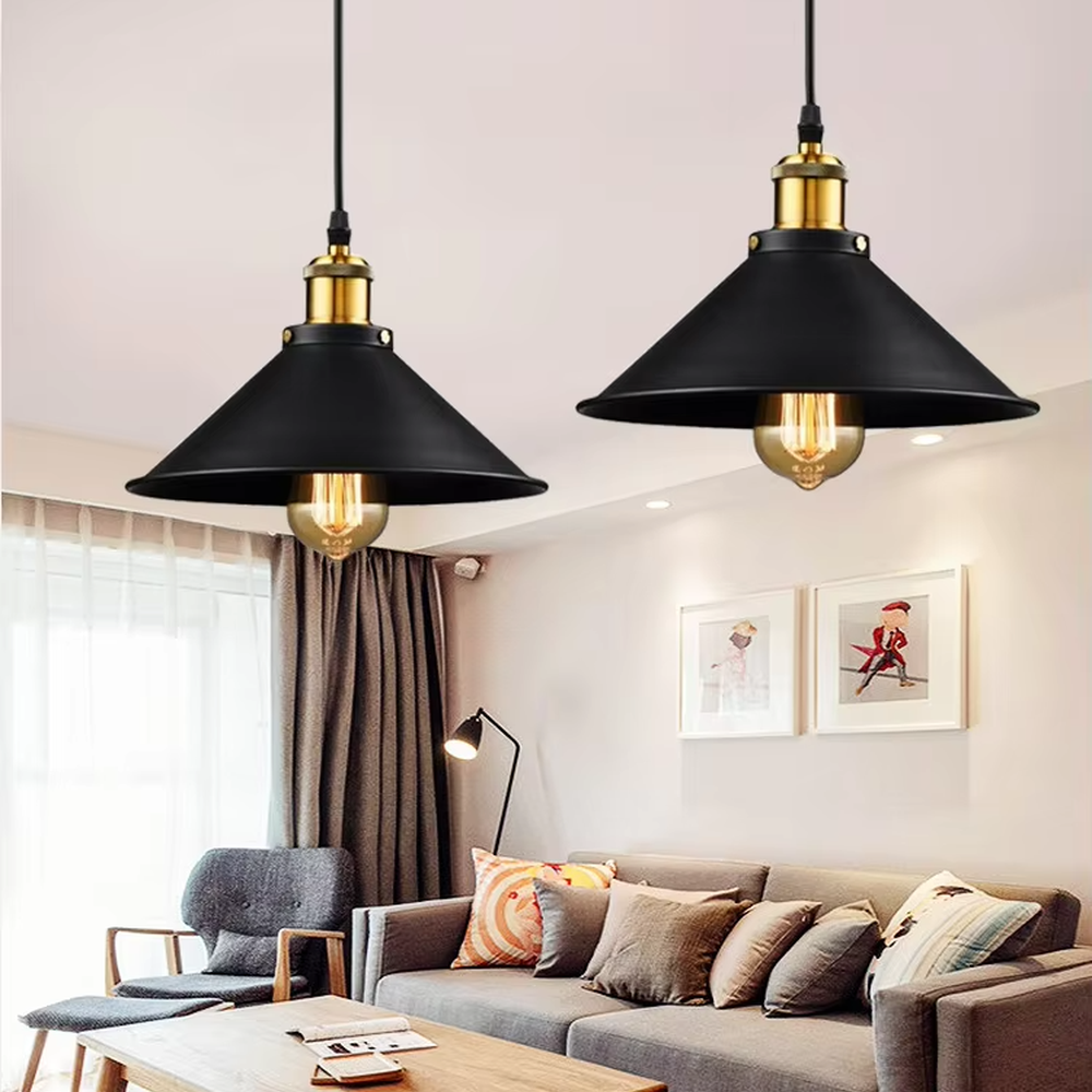 Industrial style black-gold three-head cone chandelier, with black iron lampshades and gold metal top details, embedded with retro Edison bulbs, providing warm and atmospheric light, used for lighting and decoration in dining tables, bars and other areas, suitable for industrial, modern minimalist home and commercial spaces