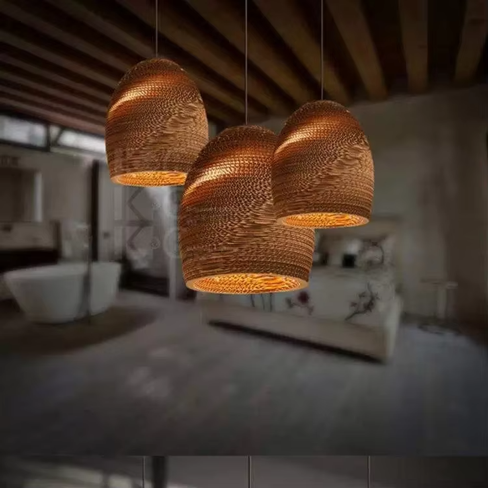 This is a set of natural artistic paper chandeliers, featuring various geometric shapes made of corrugated paper with brown textures, simple and natural, and artistic in design. It is used for space lighting and decoration, creating a natural and artistic atmosphere. It is suitable for Nordic-style home dining rooms, creative cafes, art studios and other places.