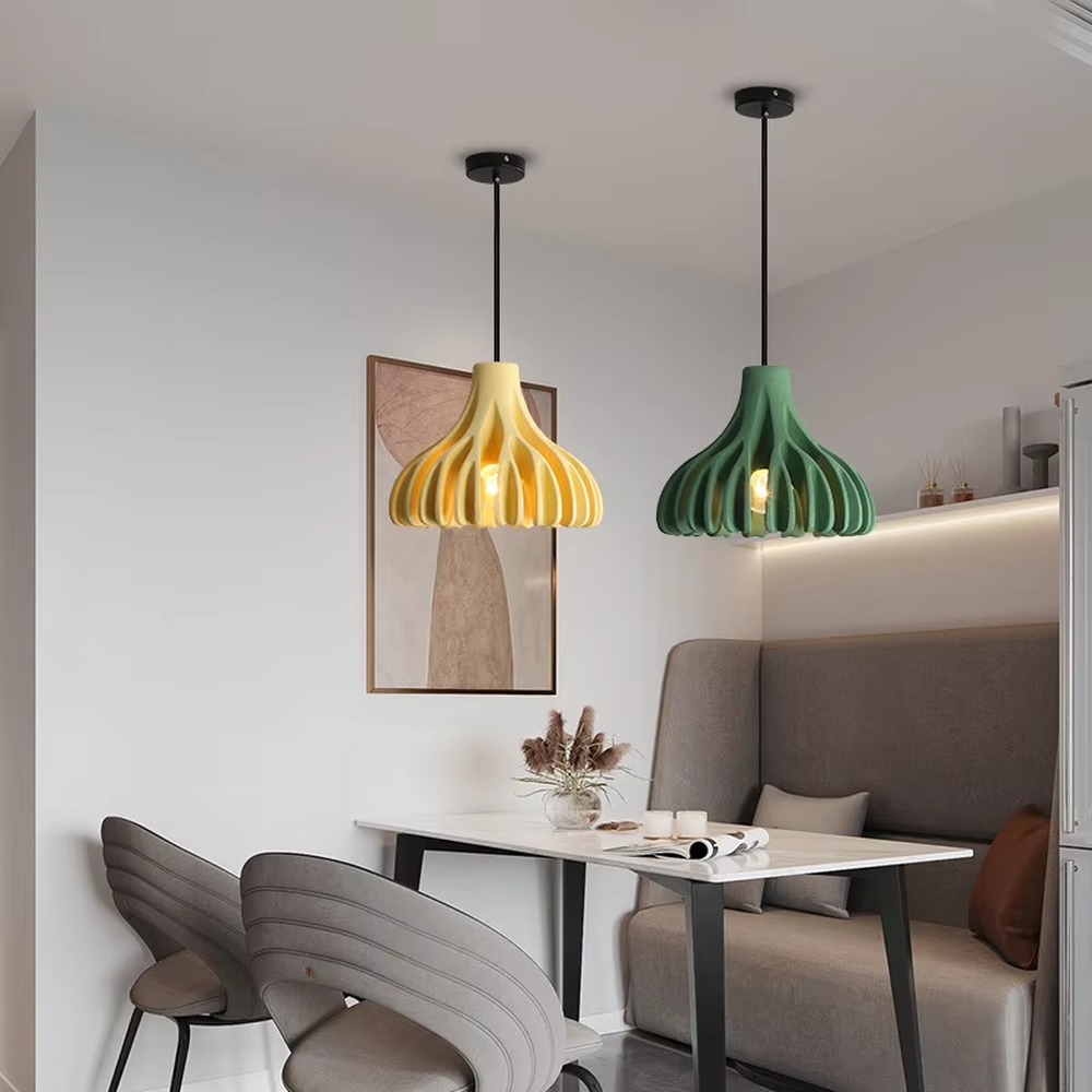 Fresh bud-folded shape multi-color hanging chandelier, bright colors like yellow/green + fan-folded lampshade + black suspension rope, soft warm light, creating a lively and fresh home atmosphere.
