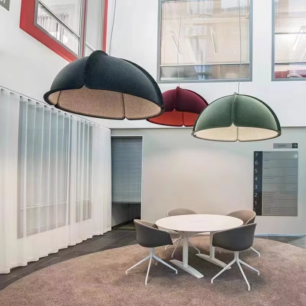 This is a modern minimalist gray spliced dome chandelier, with a gray spliced dome shape, metal rivet details, and an inner warm light design, featuring a minimalist and grand style. It is used for space lighting and decoration, creating a warm and modern atmosphere. Suitable for modern minimalist living rooms, Nordic-style restaurants, creative office areas and other places.