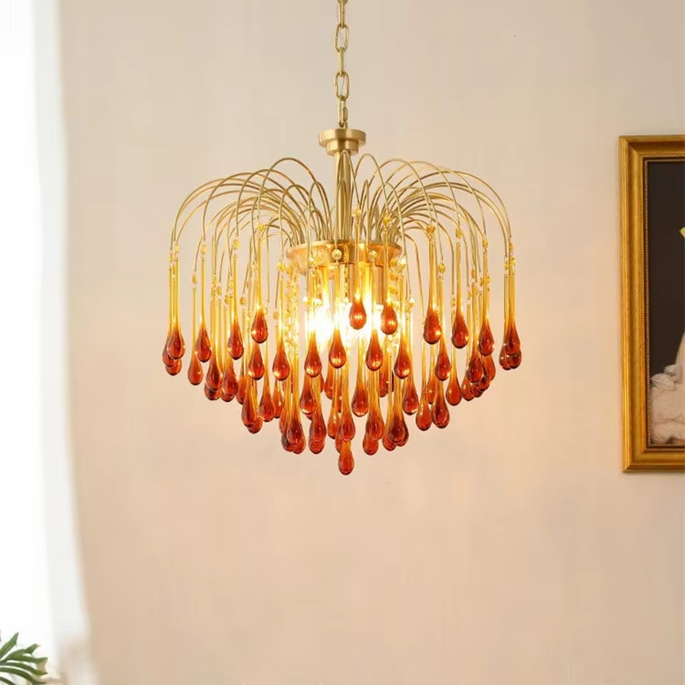 Vintage light luxury golden metal wireframe amber waterdrop glass chandelier, warm light effect, creating a cozy vintage luxurious atmosphere.