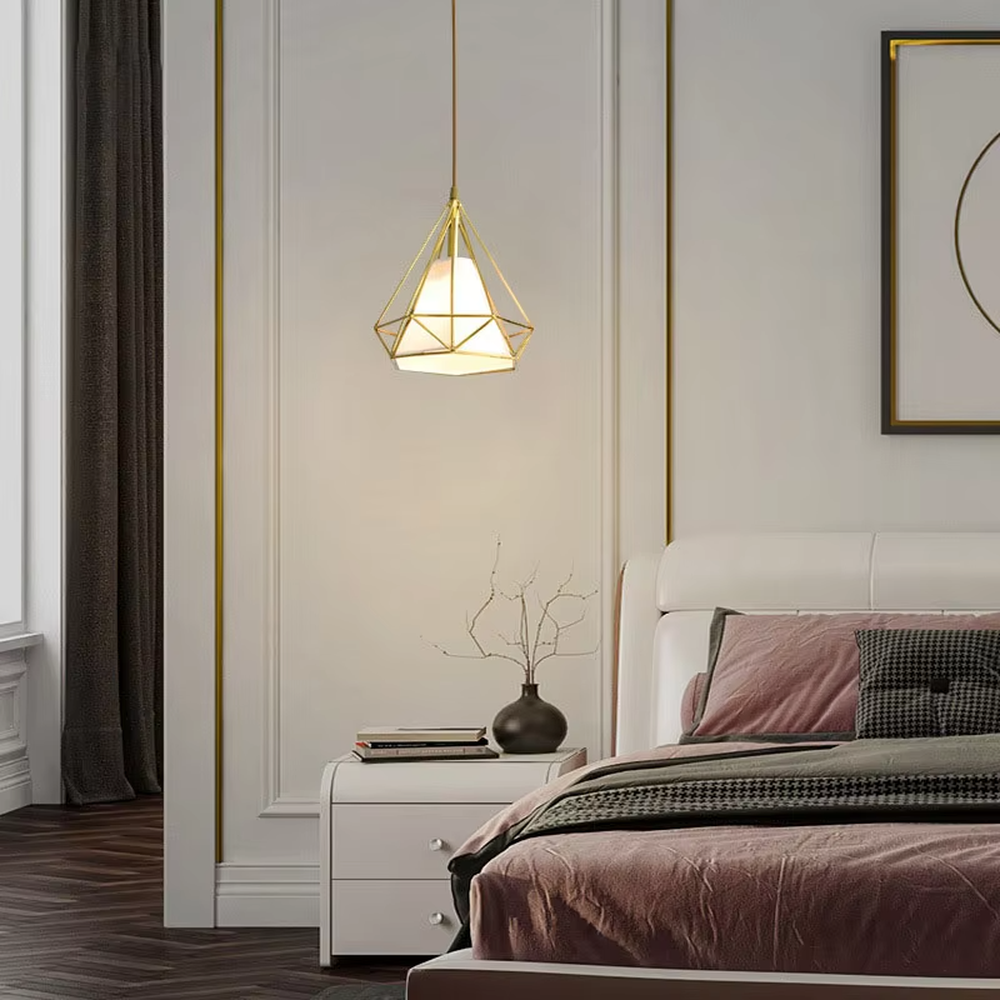 Light luxury geometric diamond triple chandelier (gold metal frame + translucent lampshade), warm light effect, creating a stylish and exquisite space atmosphere.