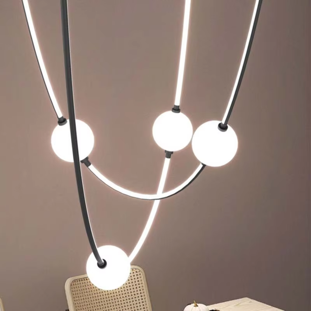 Modern creative curved frame hanging chandelier, black curved metal frame + white light strip + white spherical lampshades, soft and flexible lighting, creating an artistic minimalist atmosphere.