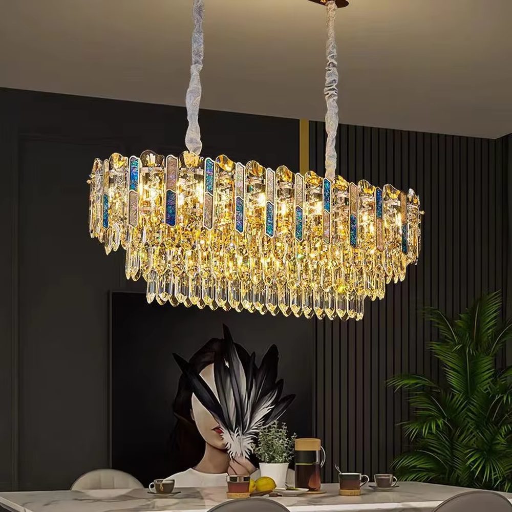 Light luxury circular golden crystal chandelier, dotted with blue decorative blocks, brilliant and gorgeous lighting, creating a high-end light luxury atmosphere.
