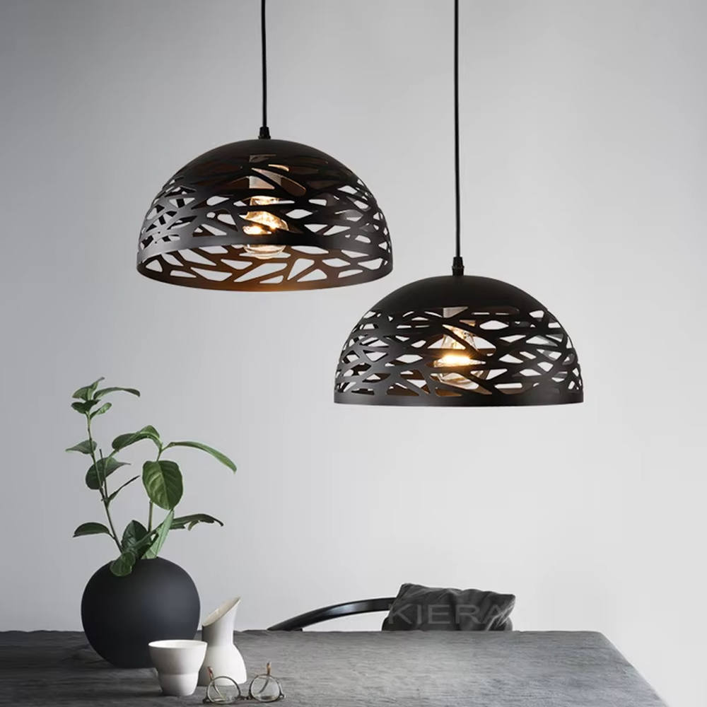 This minimalist hollow spherical chandelier features irregular hollow textures made of metal, available in black and white color options. It emits soft diffused light when lit, serving both lighting and decorative purposes, ideal for dining rooms, living rooms, modern homes and other scenarios.
