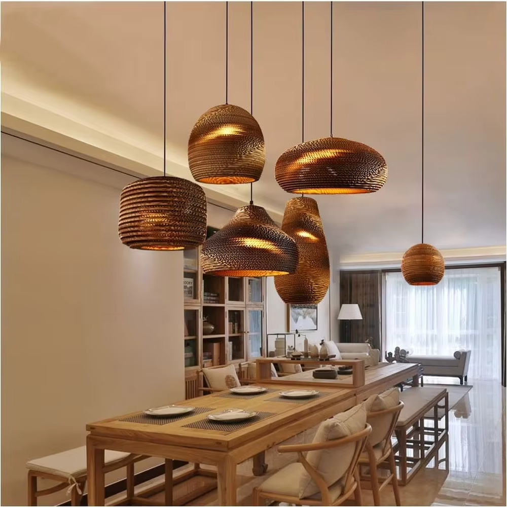 This is a set of natural artistic paper chandeliers, featuring various geometric shapes made of corrugated paper with brown textures, simple and natural, and artistic in design. It is used for space lighting and decoration, creating a natural and artistic atmosphere. It is suitable for Nordic-style home dining rooms, creative cafes, art studios and other places.