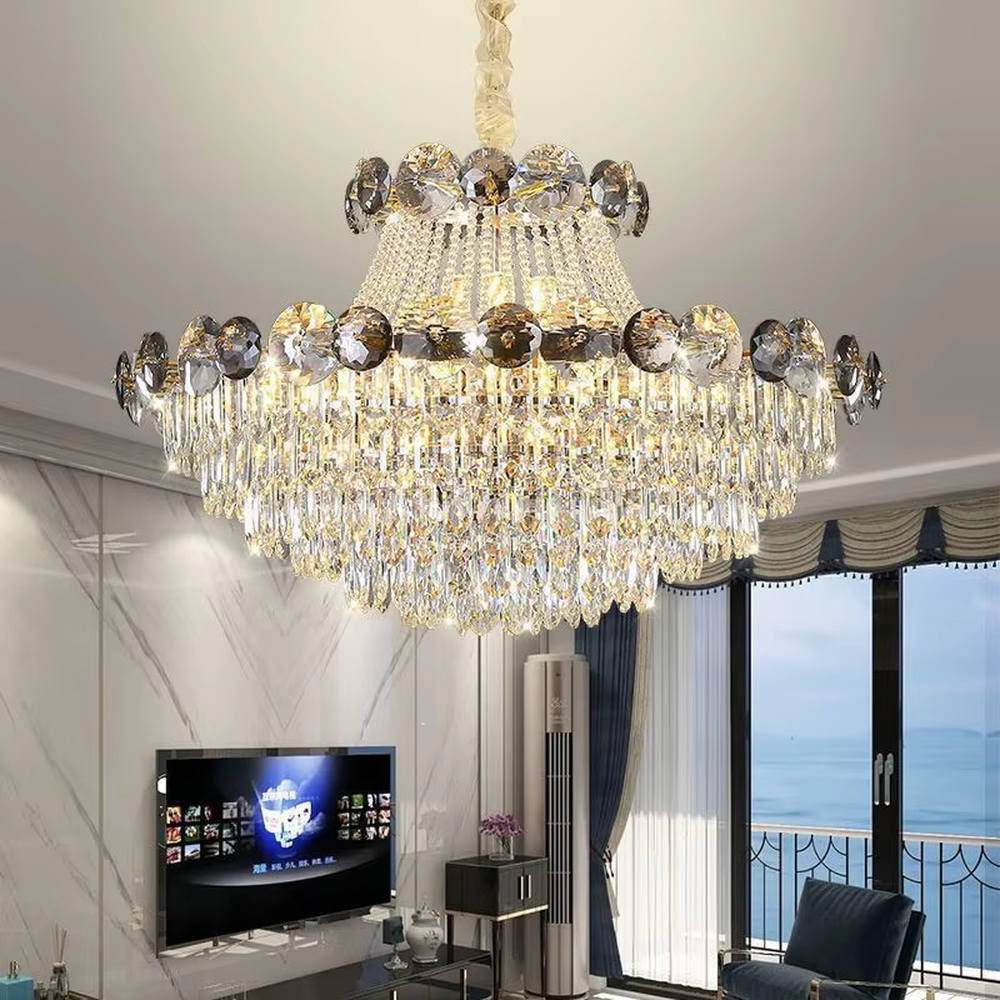 This is a luxurious classical multi-layer crystal chandelier, combining transparent and smoky gray crystals with a multi-layer hanging design. It features brilliant lighting and grand luxury. It is used for space lighting and decoration, creating a luxurious and noble atmosphere. Suitable for luxury living rooms, high-end hotel lobbies, villa banquet halls and other places.
