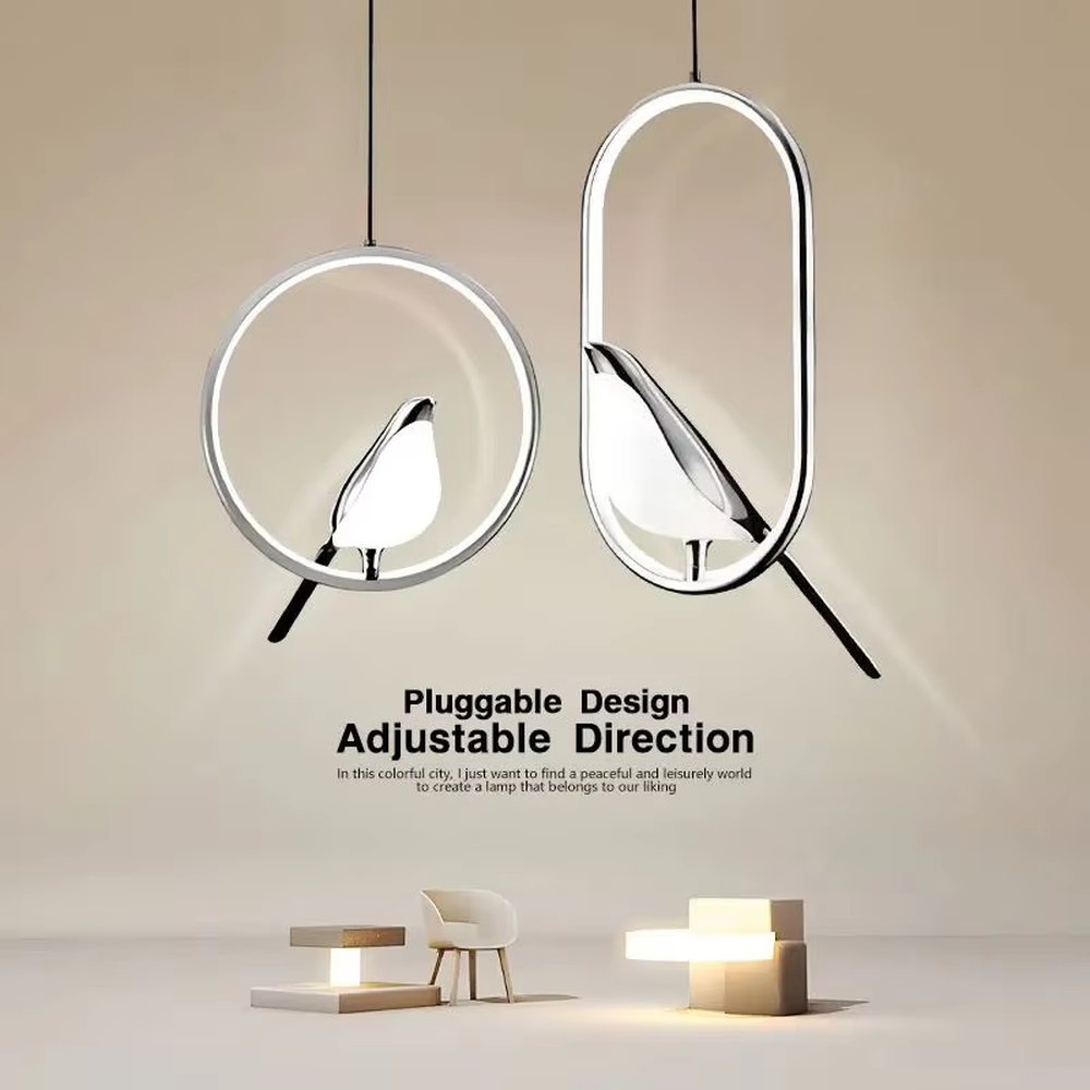 This modern minimalist chandelier features a black metal oval frame, paired with a beveled gold decorative piece and soft LED light source. It has a minimalist and design-conscious shape, serving both lighting and decorative purposes, ideal for modern minimalist spaces such as bedroom bedside tables, living room side tables, and hotel guest rooms.