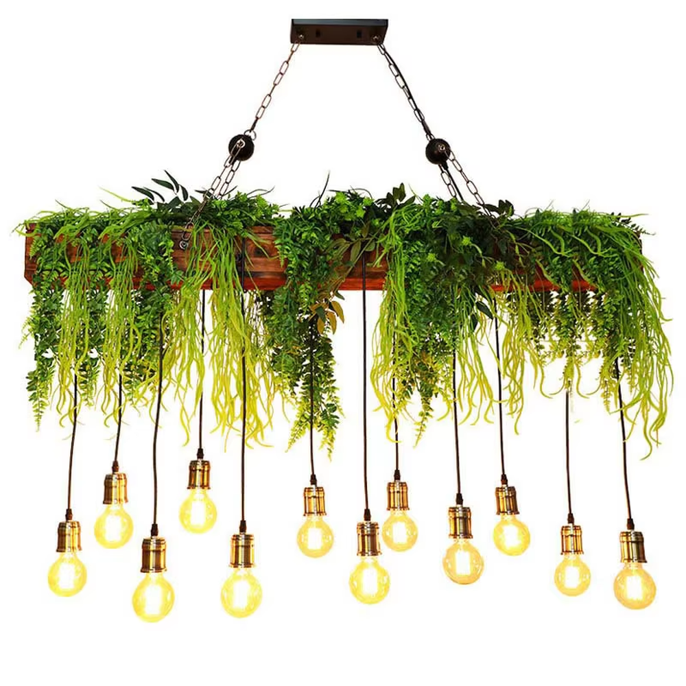 This is a natural and romantic floral retro chandelier, decorated with a large number of artificial flowers (pink and purple roses, etc.) and green plants (ferns, monstera leaves), paired with retro bulbs and a black metal frame. The design is natural and warm, with soft warm yellow lighting. It is used for space lighting and decoration, creating a natural romantic and warm retro atmosphere. Suitable for wedding venues, literary cafes, Nordic-style homestays, nature-themed restaurants and other places.